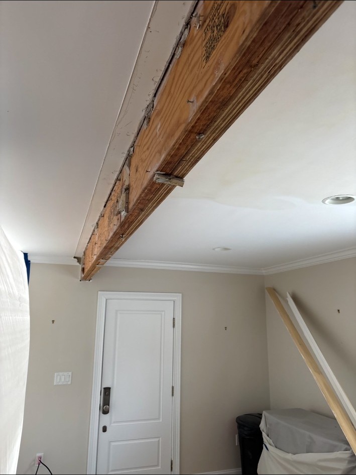 Interior ceiling beam stripped during restoration