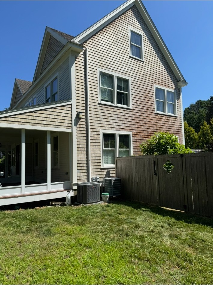 Cedar shingle house exterior before painting